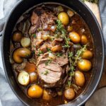 beef eye round roast slow cooke 1 Tender beef round eye roast slow cooked with baby potatoes, carrots, and celery in a rich broth