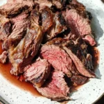 The Only Chuck Eye Roast Beef Recipe You’ll Ever Need (Seriously!) 1 Slow-cooked chuck eye roast beef sliced in rich gravy with carrots